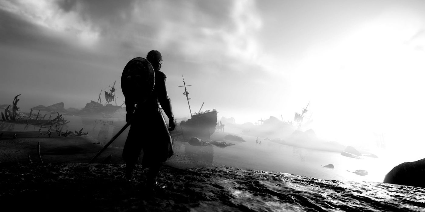 black and white image of soldier looking out at sea
