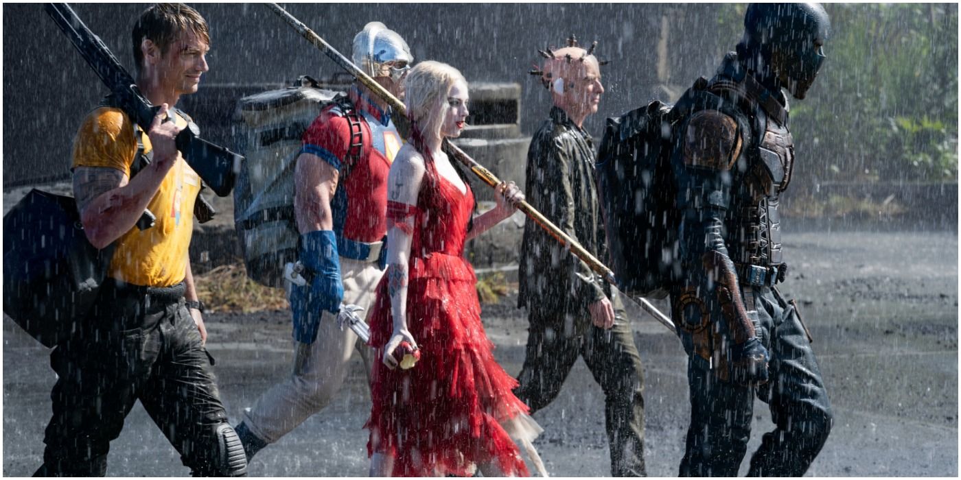 Rick Flag, Peacemaker, Harley Quinn, Thinker and Bloodsport walking in the rain