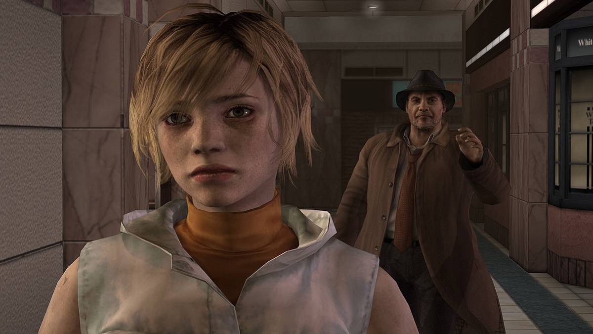 Screenshot from Silent Hill 3 showing Heather being approached from behind by Douglas Cartland.