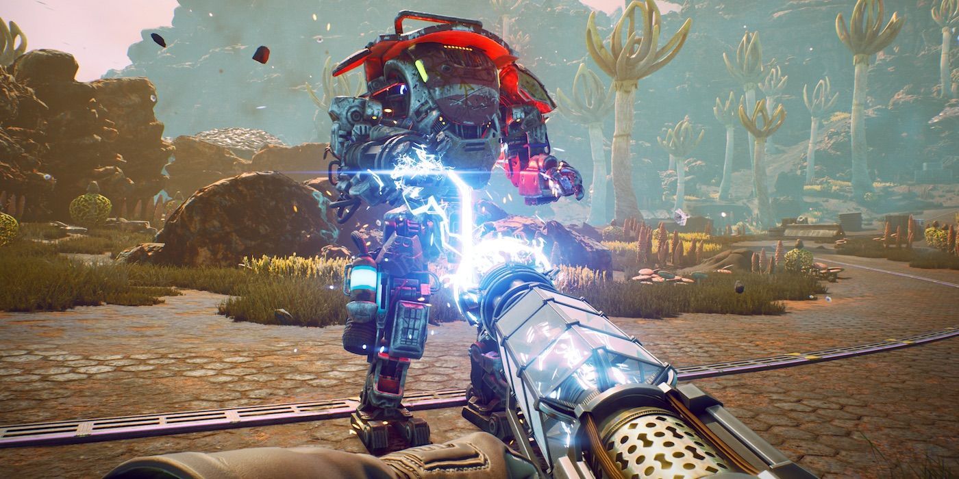 Firing electricity at mech with trees and rock formation in The Outer Worlds 