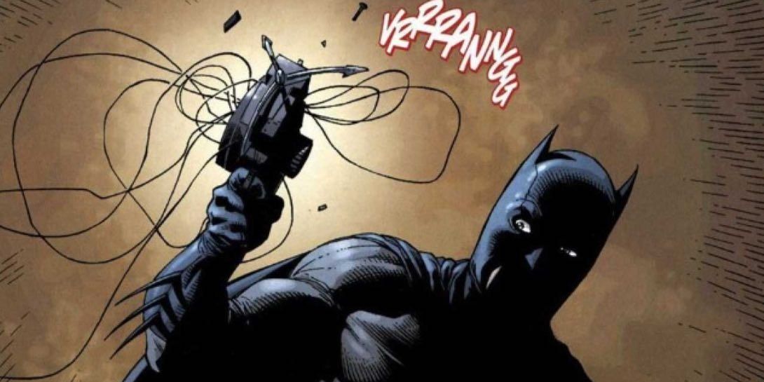Batman uses a grapple gun