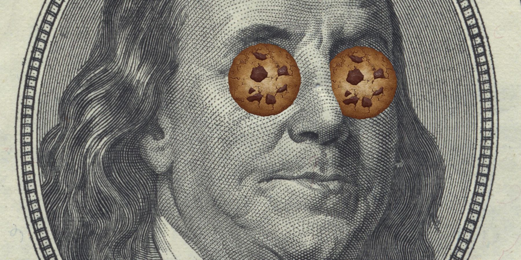 Benjamin Franklin dollar bill portrait with cookies over the eyes