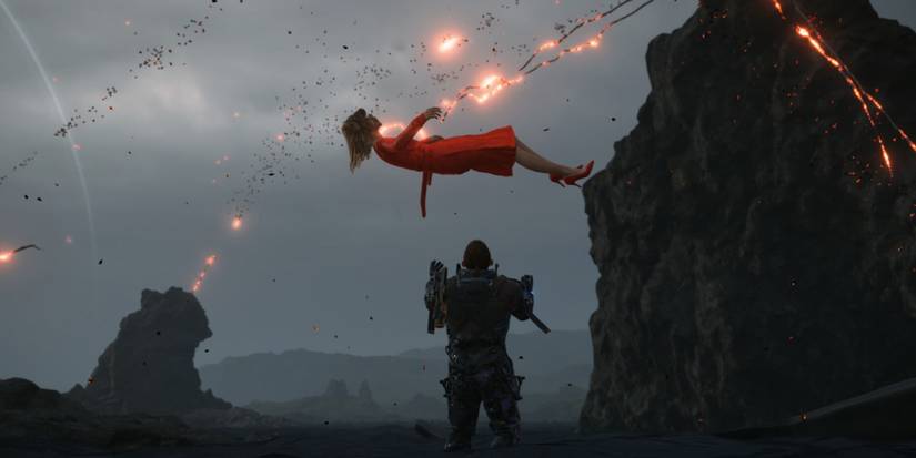 Death Stranding  - Amelie Floating Down To Sam With Strands Attached To Her