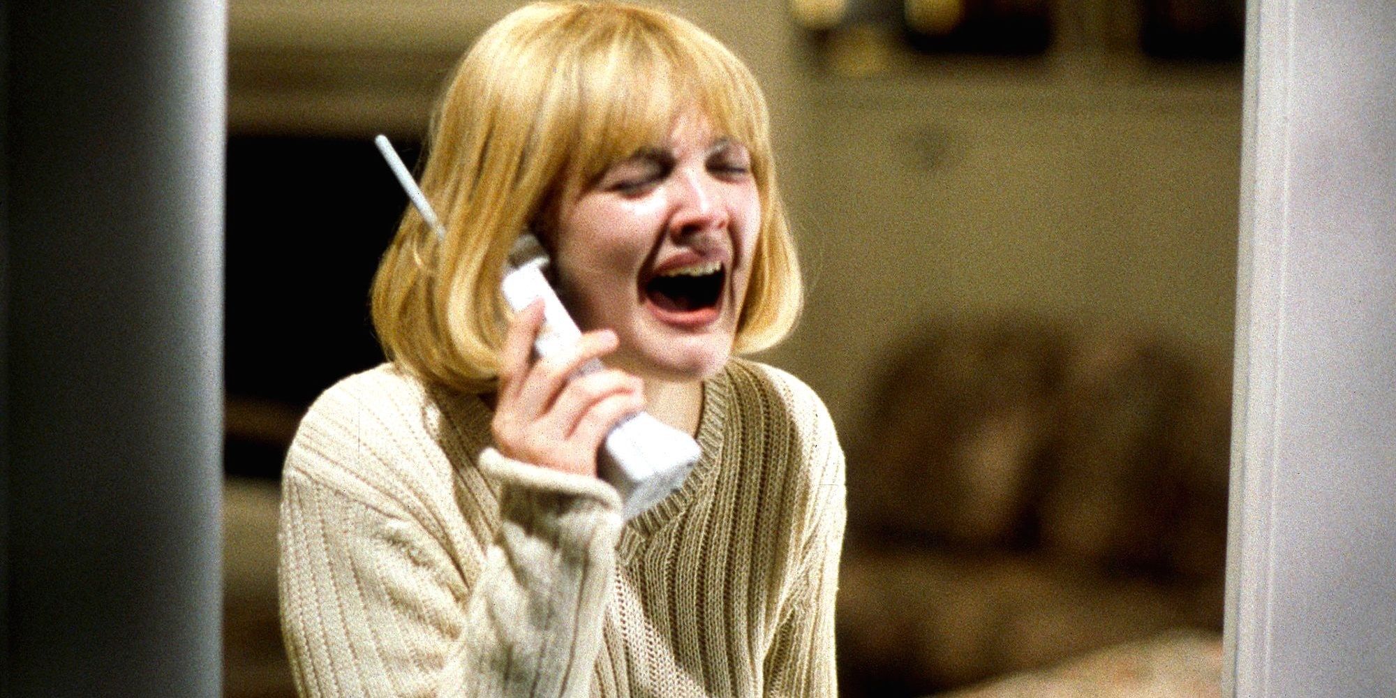 Drew Barrymore as Casey talks on the phone in Scream