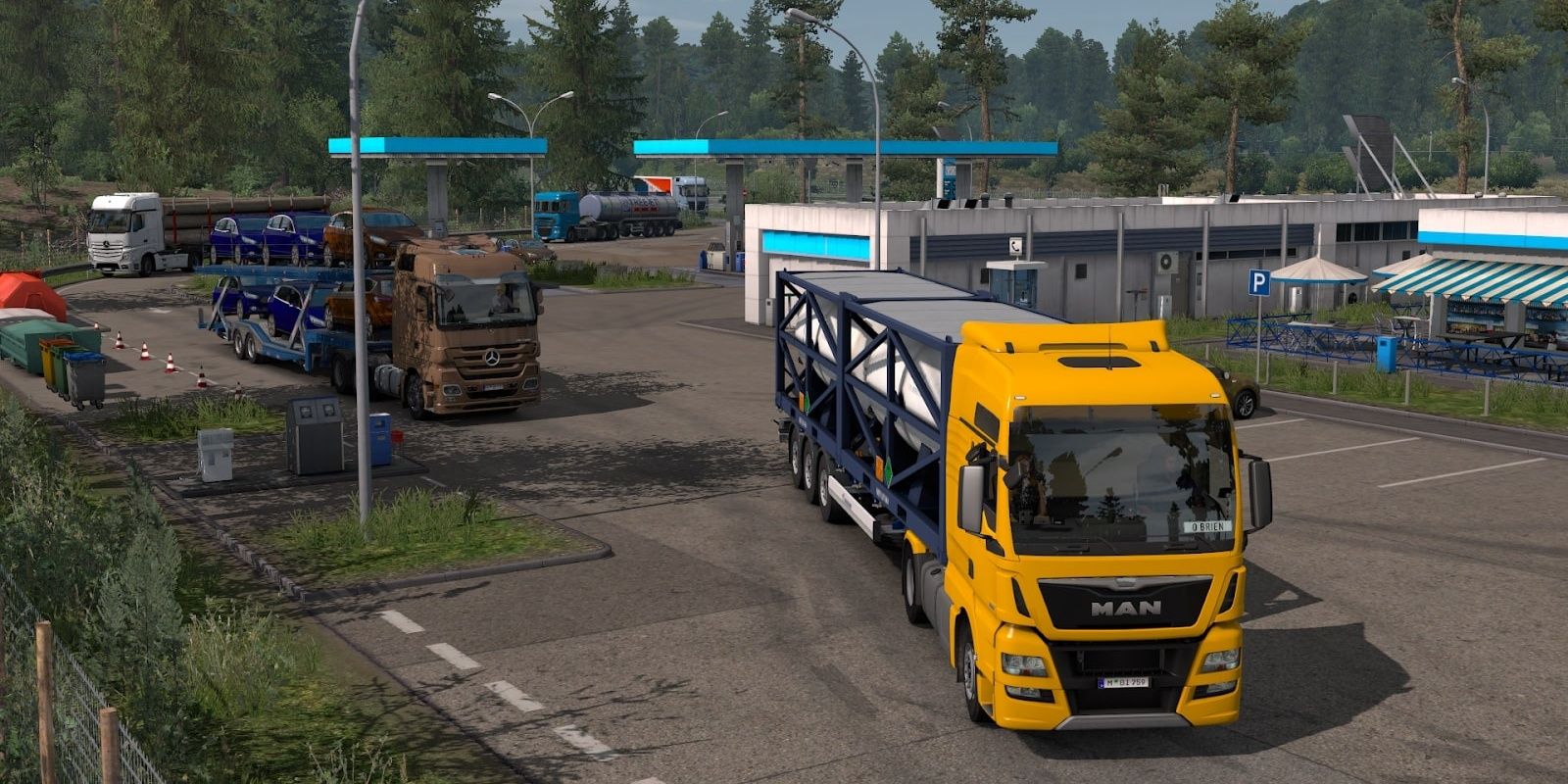 Two trucks pulling out of a gas station in Euro Truck Simulator 2