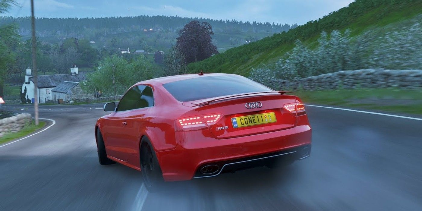 Forza Horizon 4 Audi RS5 Coupe rounding turn on hilly village road
