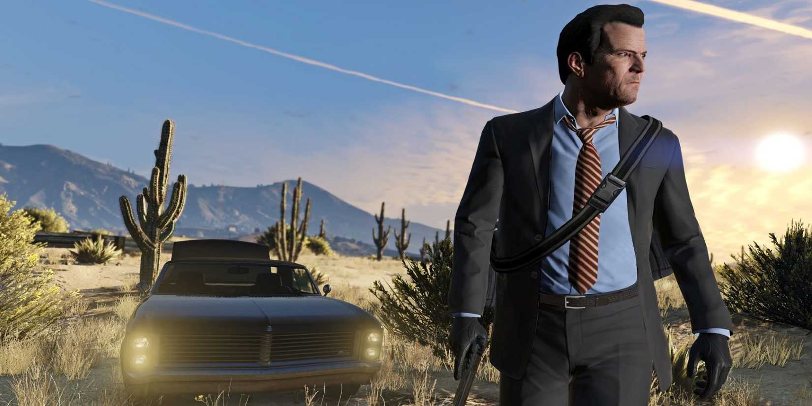 Michael de Santa from Grand Theft Auto 5 standing in front of a car in the desert