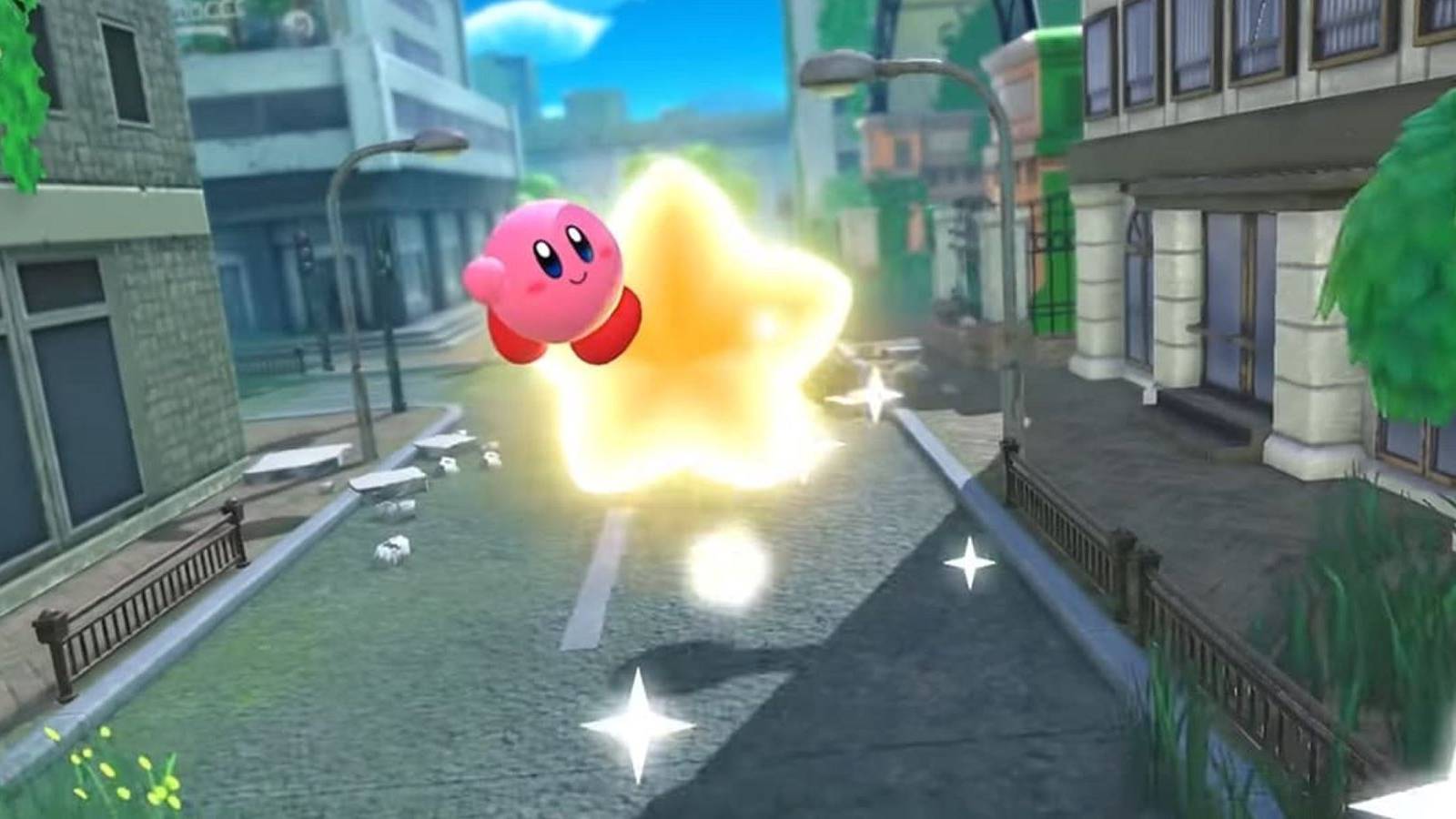 Kirby flying down a city street on a Warp Star in Kirby and the Forgotten Land
