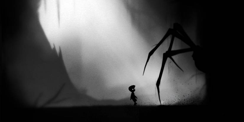 The protagonist of Limbo confronted by a giant, shadowy spider