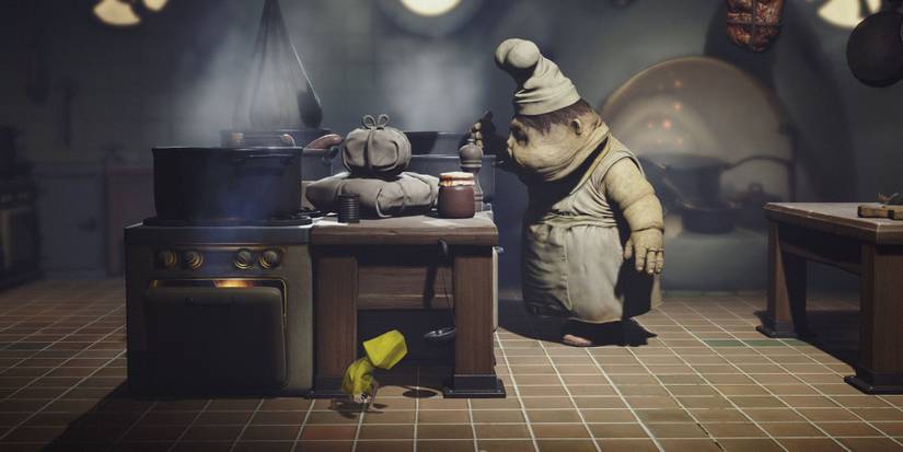 Six from Little Nightmares sneaking past a grotesque chef in the kitchen