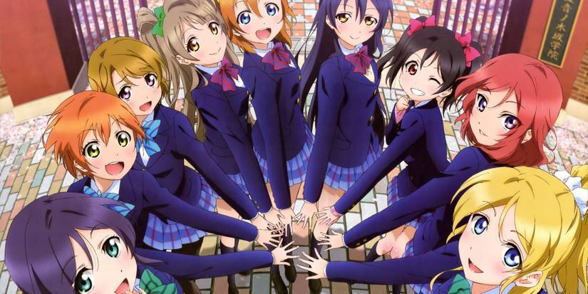 Nine characters from Love Live! School Idol Project anime putting their hands together