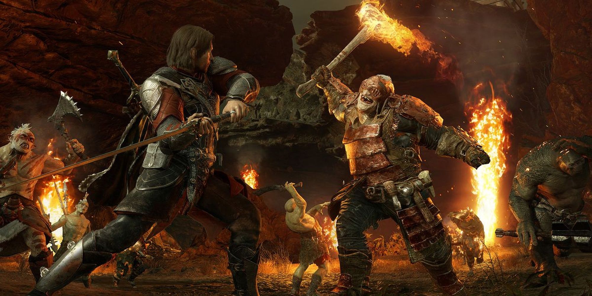 Middle-Earth Shadow of War Orc Captain charging at Talion with a flaming weapon Cropped