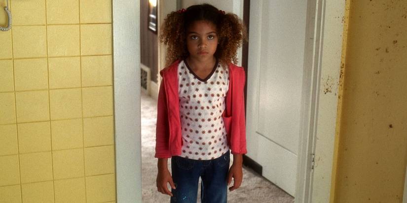 Nikki standing in the kitchen doorway in Kill Bill