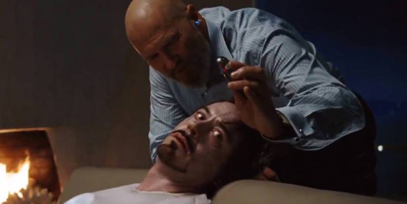 Obadiah Stane uses the sonic taser on Tony Stark in Iron Man