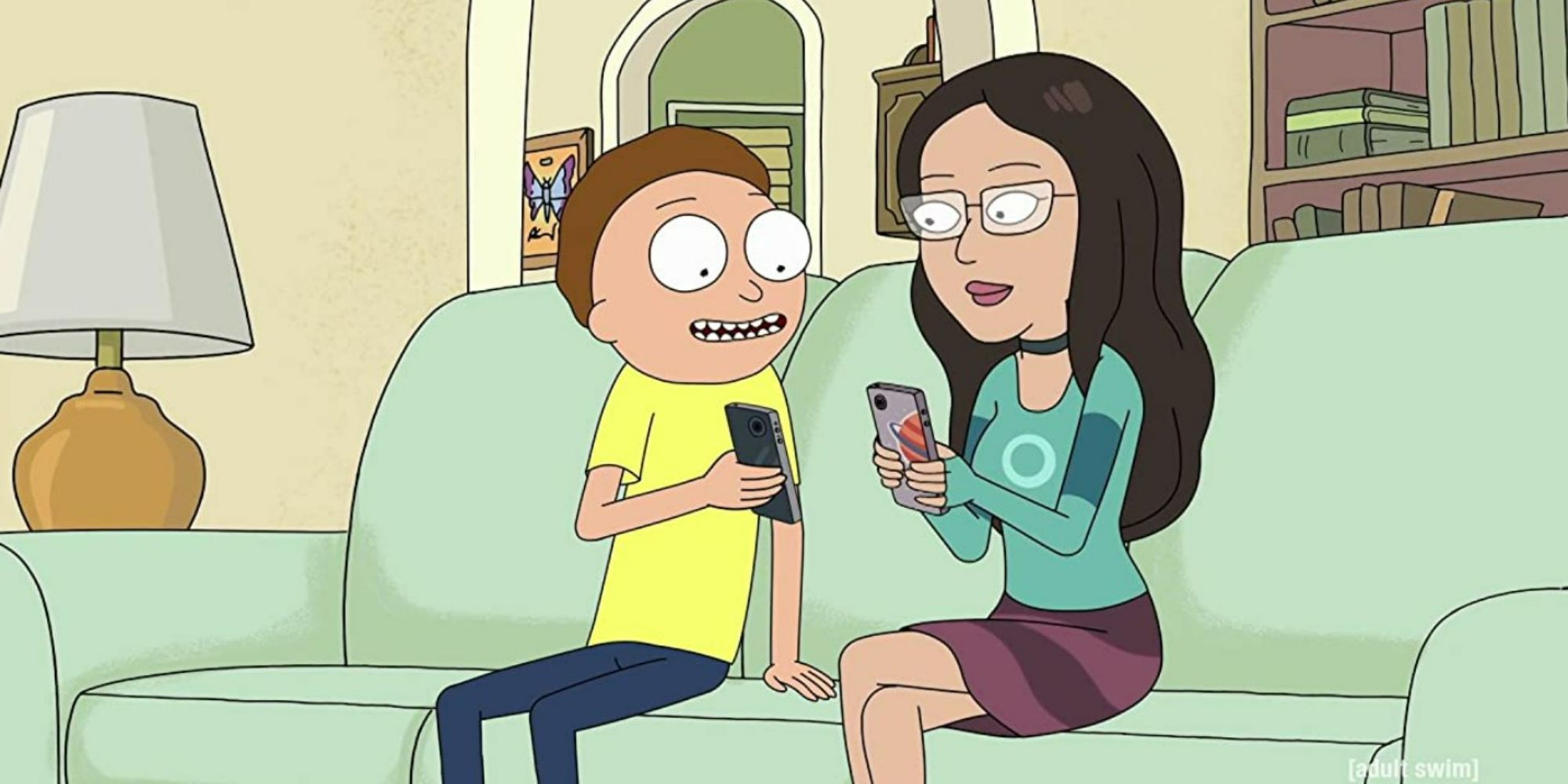 Morty and his girlfriend use their phones on the couch in Rick and Morty