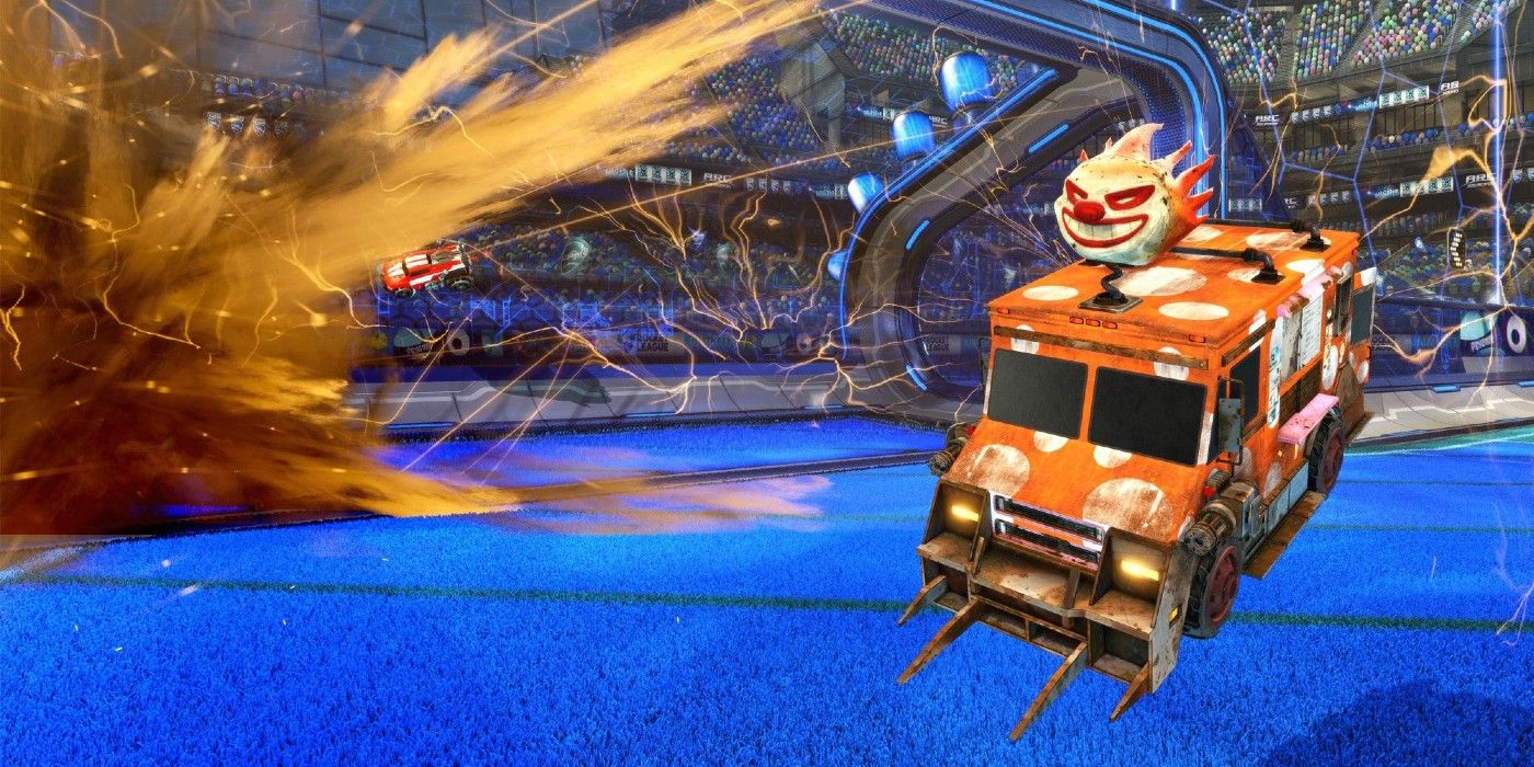 Rocket League car Sweet Tooth flying through air near goal with orange paint explosion