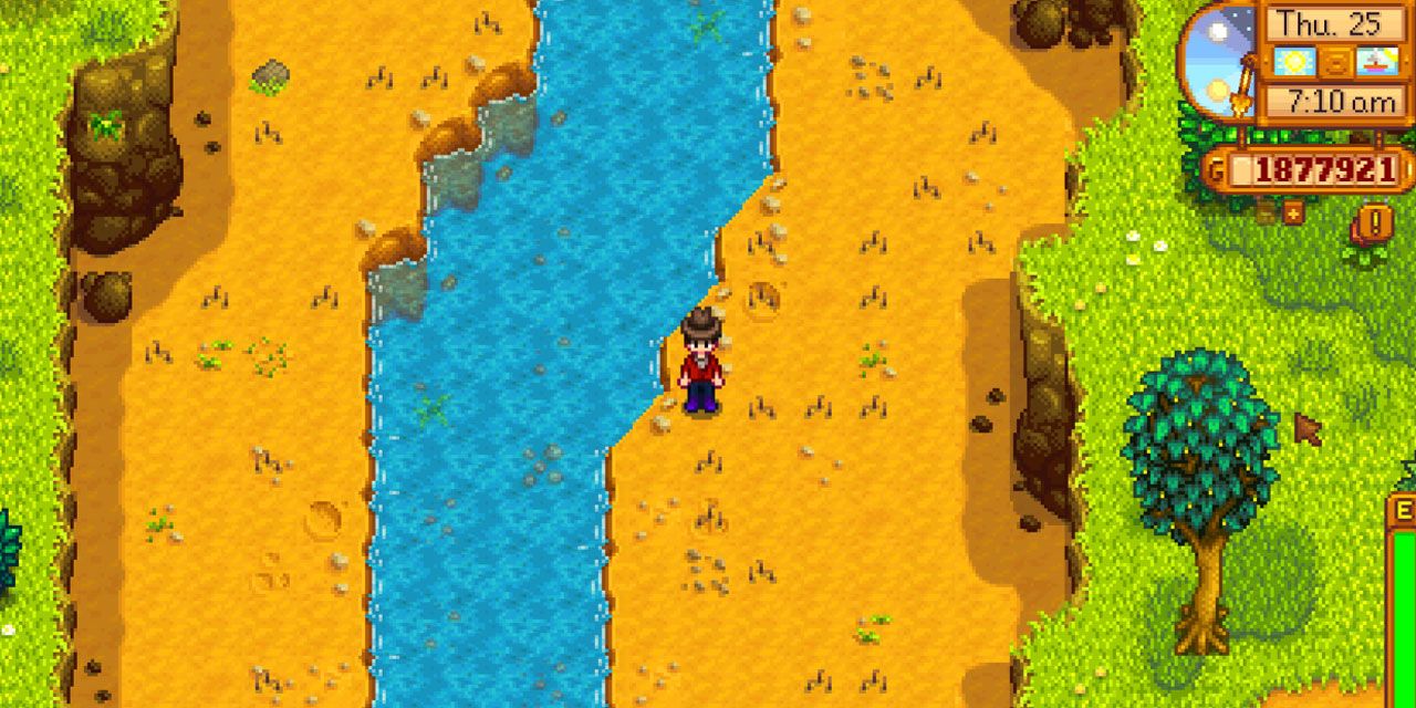 Stardew-Valley-player-character-standing-artifact-spots-near-river