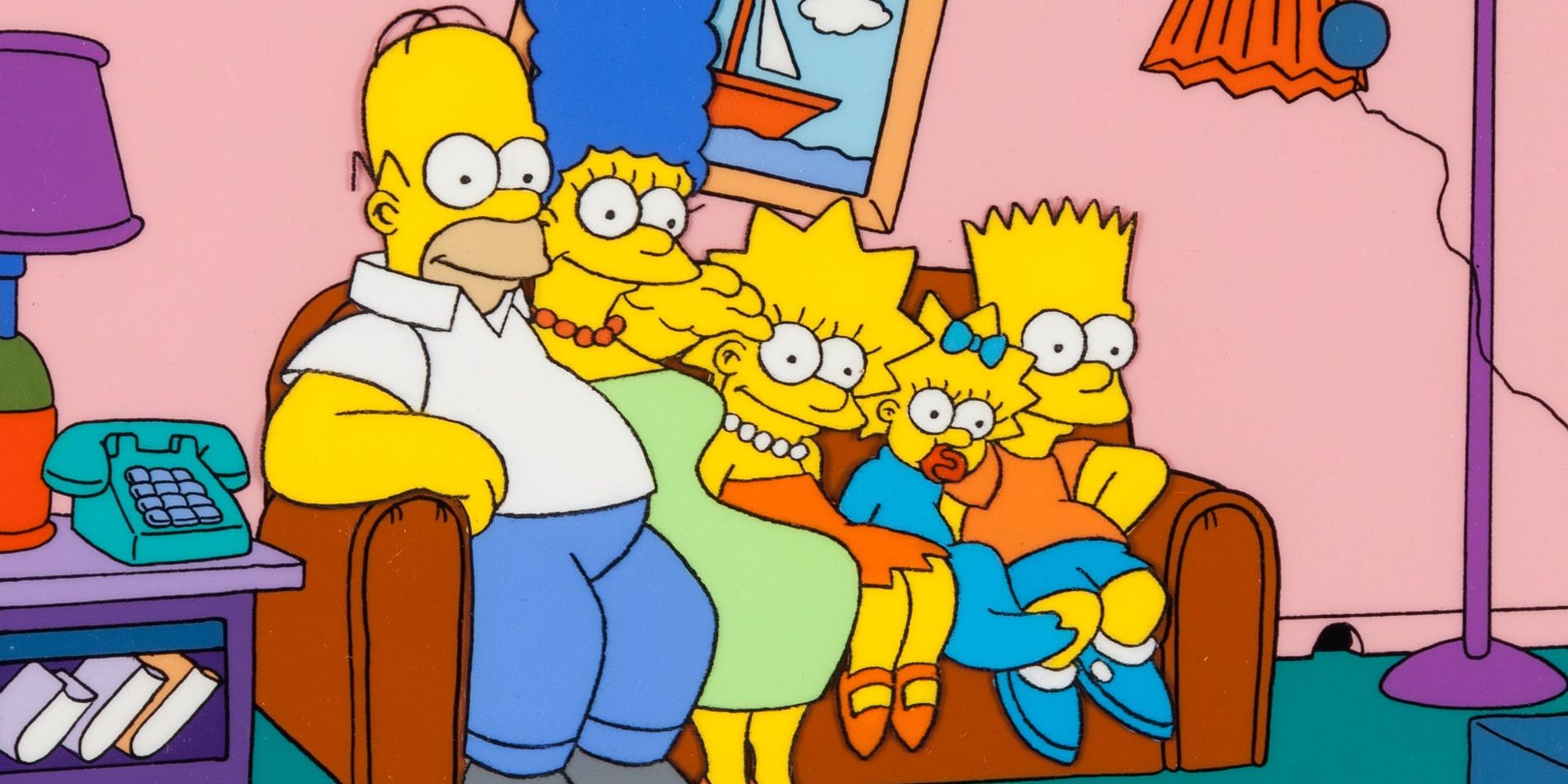 The Simpson family sitting on the couch