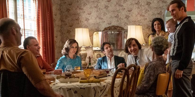 The Sopranos sitting around a dinner table in The Many Saints of Newark