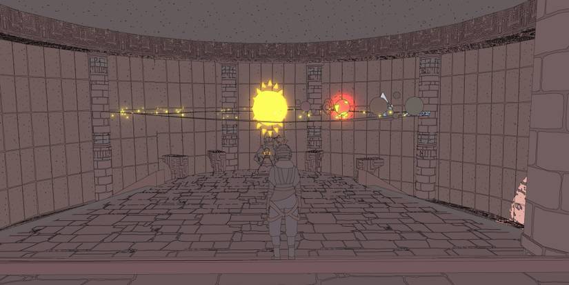 Sable standing in front of solar system model 