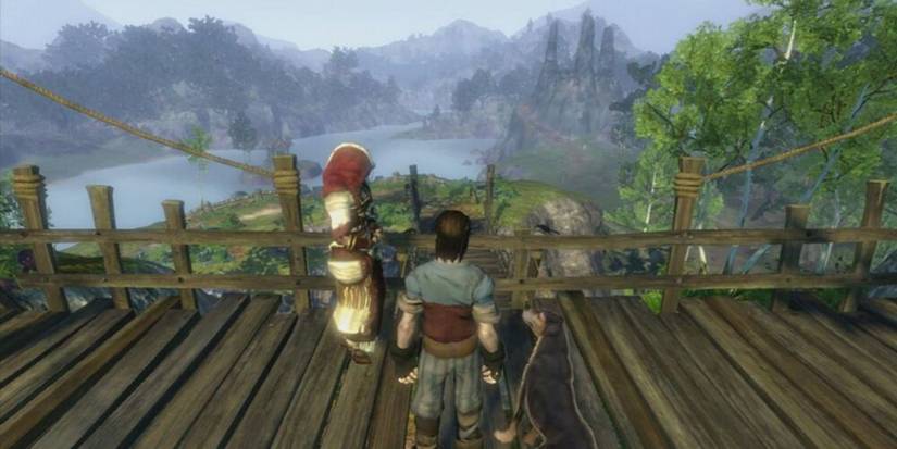 Theresa and the protagonist standing on a bridge overlooking Bower Lake in Fable 2