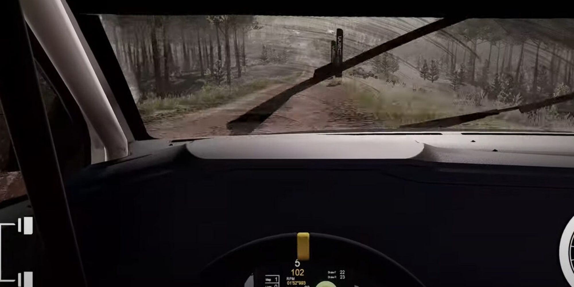 WRC-10 cockpit view of player going down a dirt road