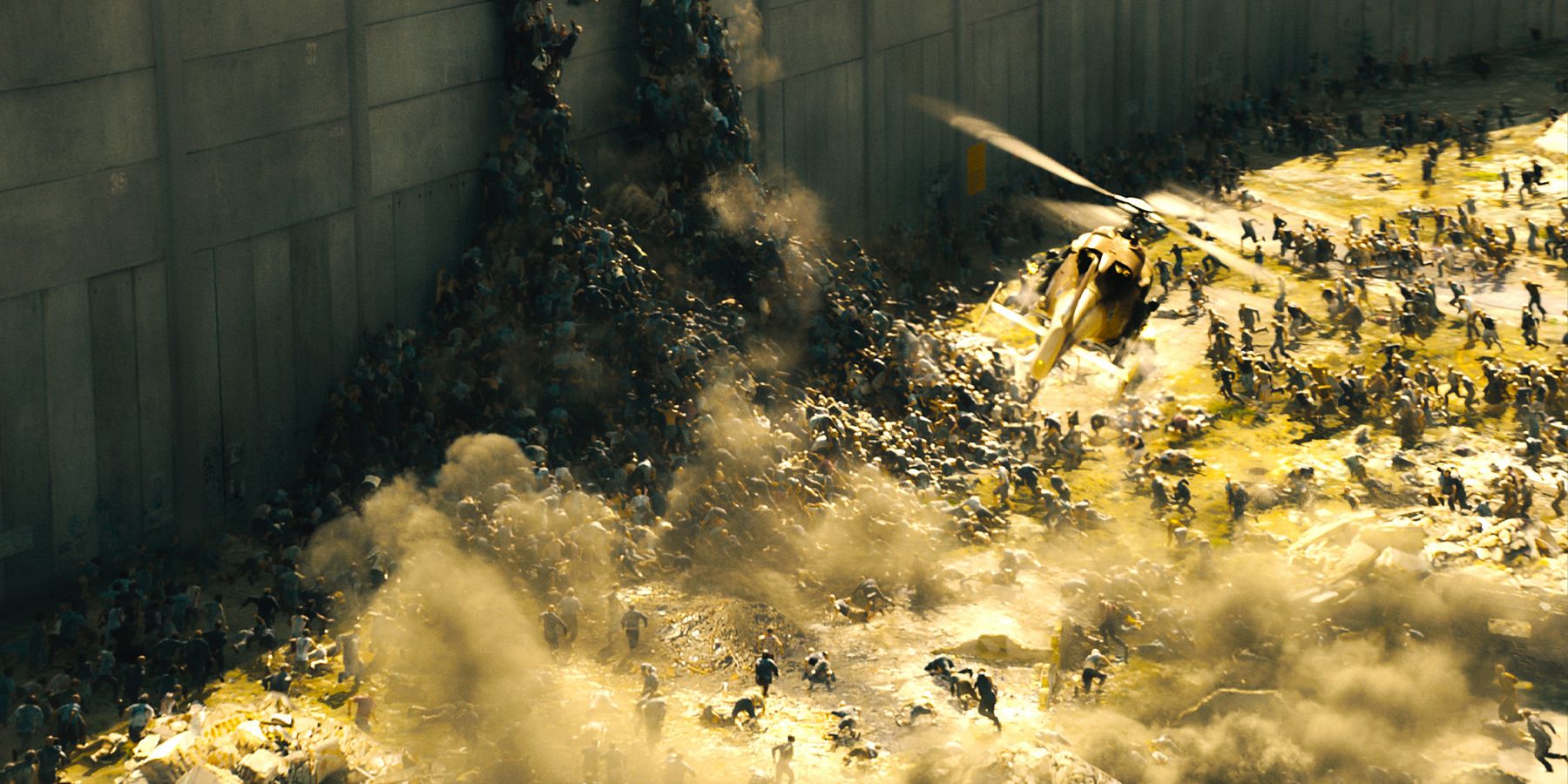 World War Z zombies crawling up wall