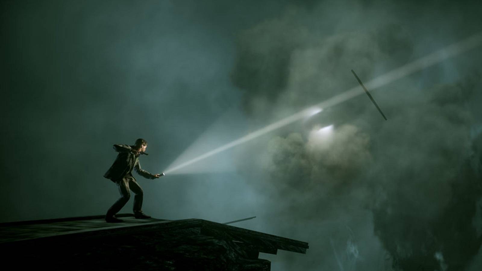 An image from Alan Wake showing the titular character approaching a broken train track.