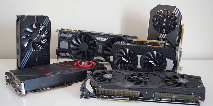 A photo showing a series of Nvidia and AMD graphics cards on a white table.