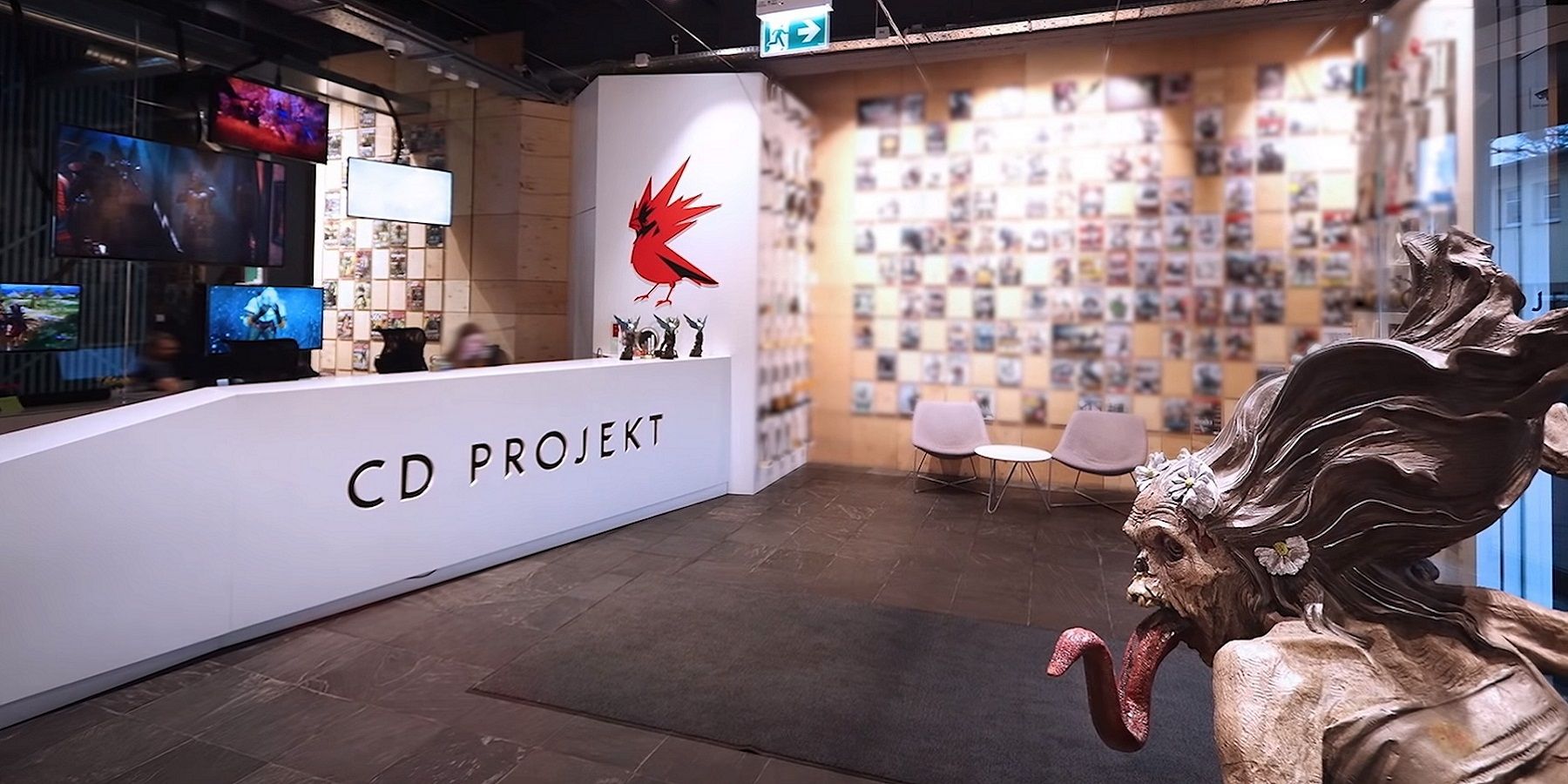 Photo of the CD Projekt Red studio, showing a monster statue in the foreground.