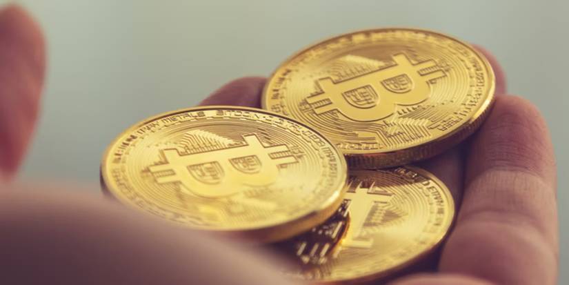bitcoins in hand