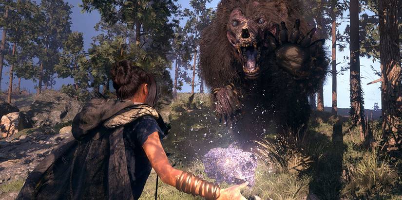 forspoken character being attacked by monster 