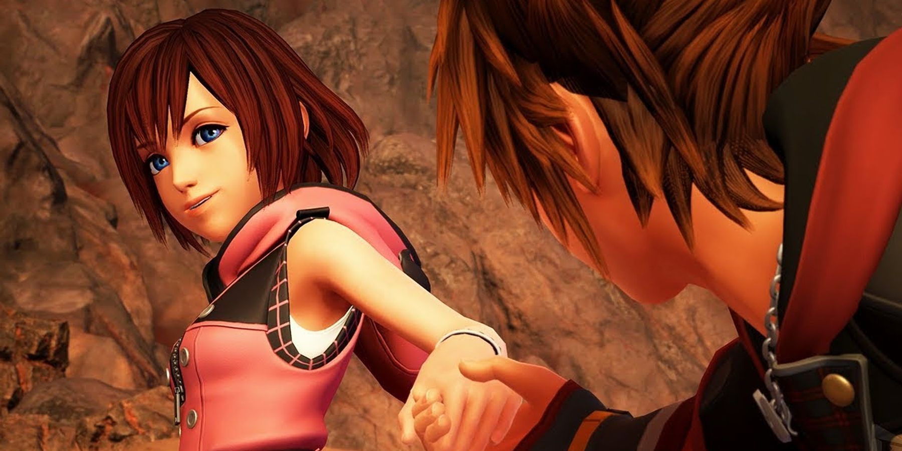 Kairi holds Sora's hand in Kingdom Hearts 3.