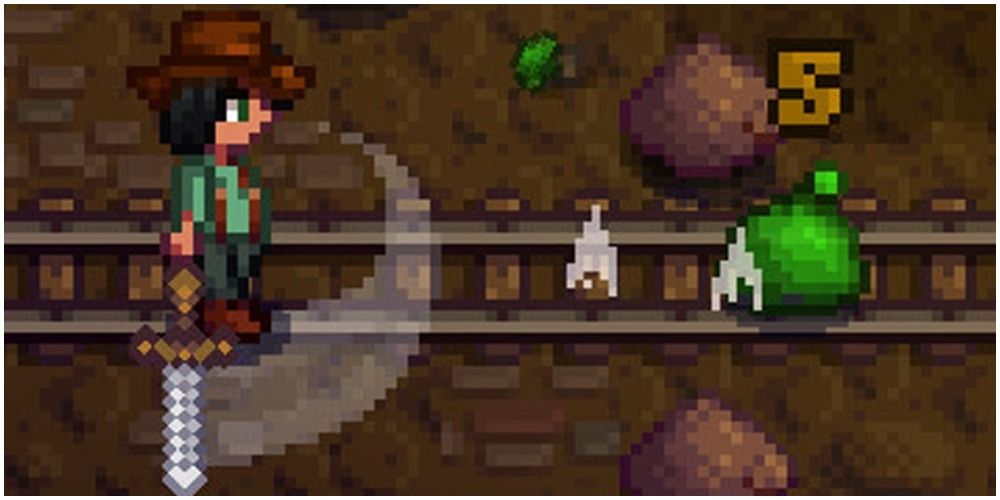stardew valley close up of a player fighting a green slime
