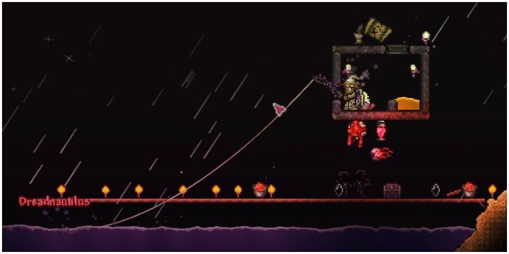 terraria player fishing during a blood moon