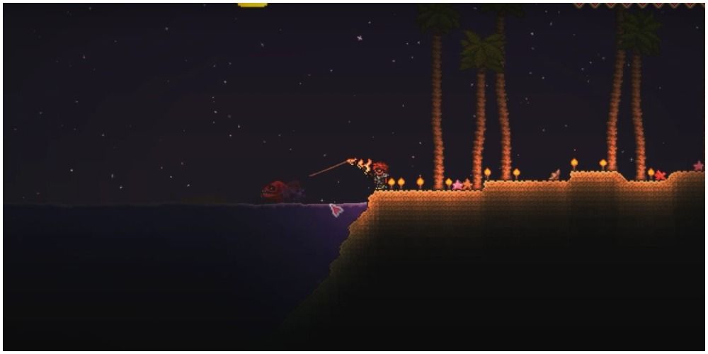 terraria player fishing up a blood eel