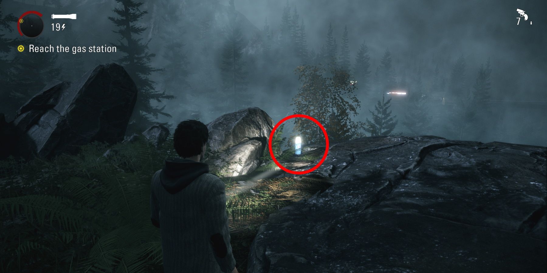 Alan Wake Remastered circled collectible in woods near gas station