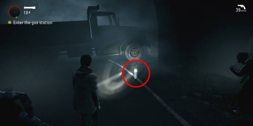 Alan Wake Remastered circled collectible near gas station