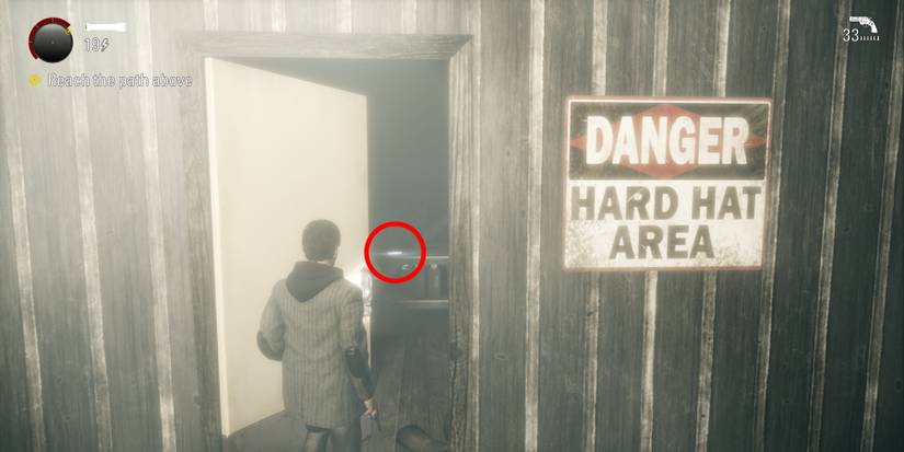 Alan Wake Remastered collectible circled lumber yard reach top of stairs area