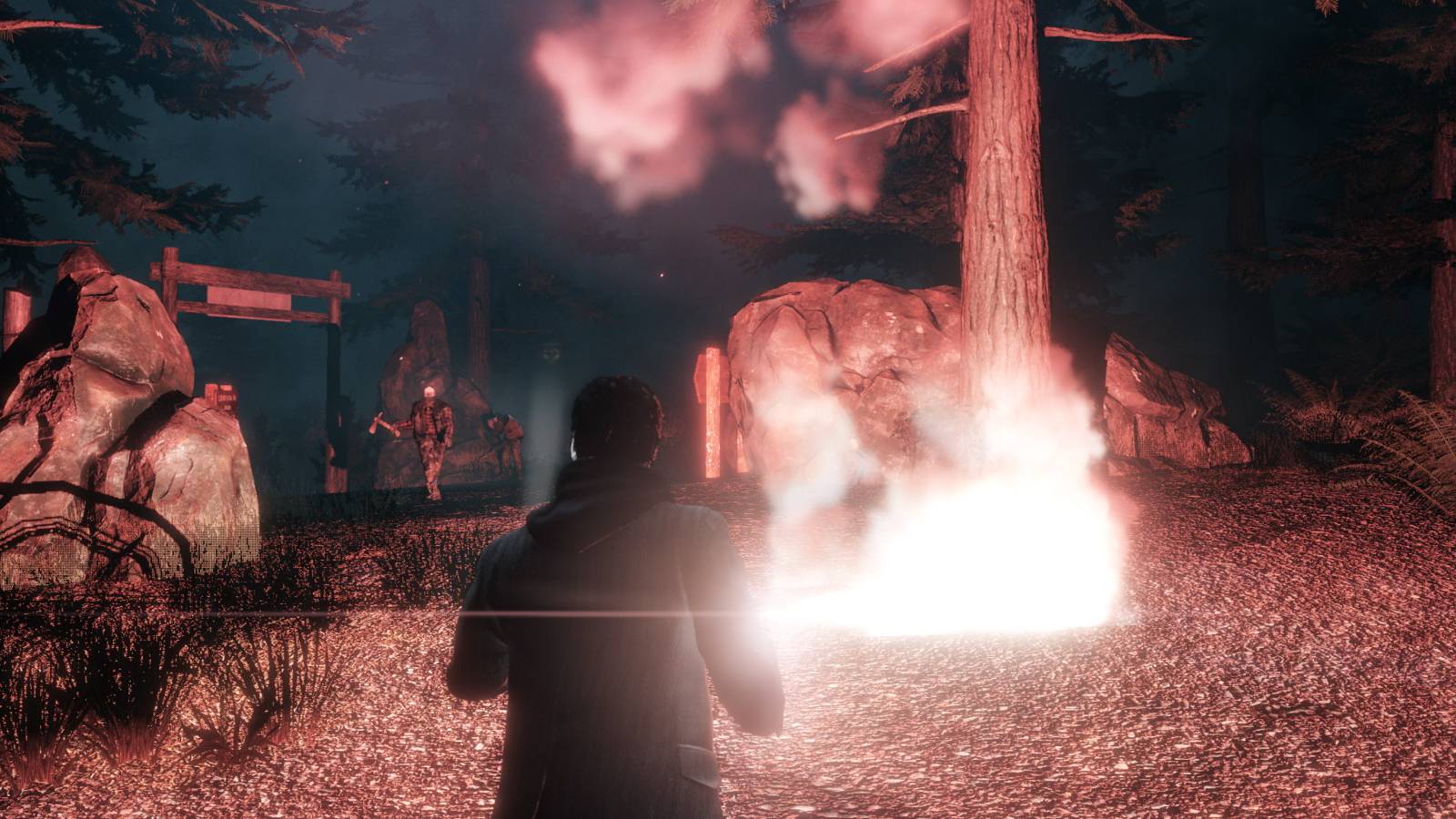 Alan Wake Remastered using flares on hordes of enemies