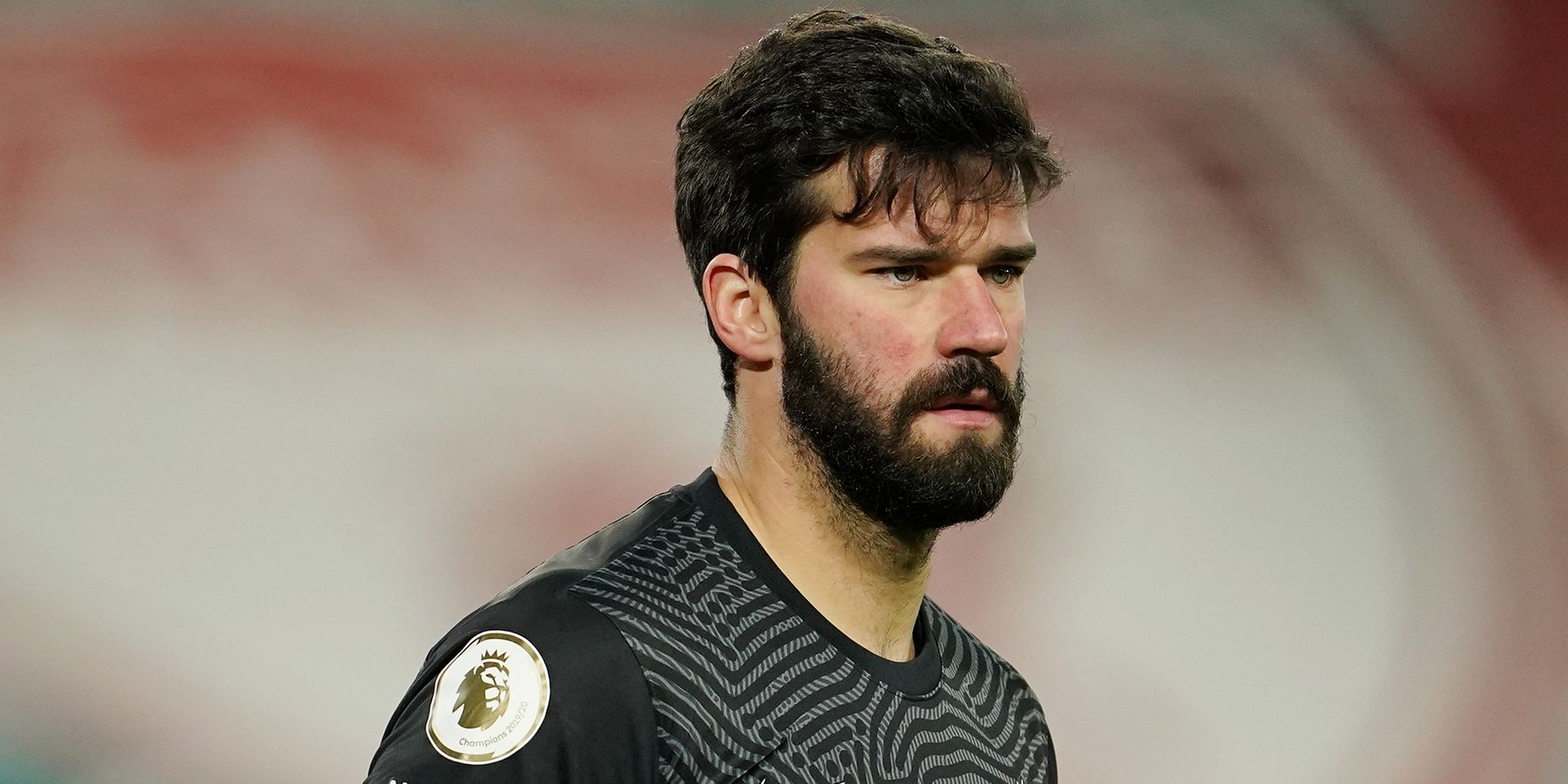 Alisson Becker playing for Liverpool
