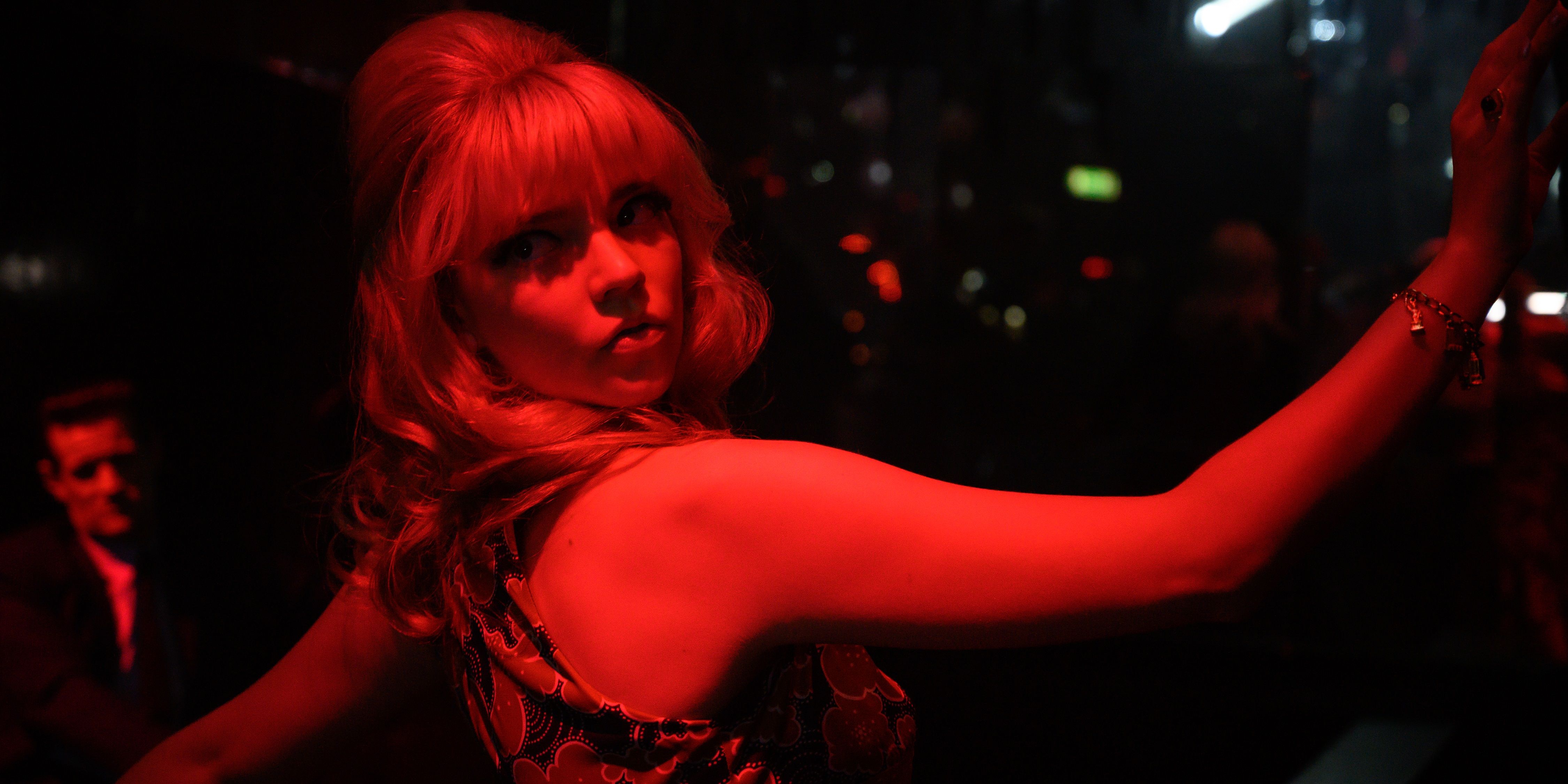 Anya Taylor-Joy draped in red light in Last Night in Soho
