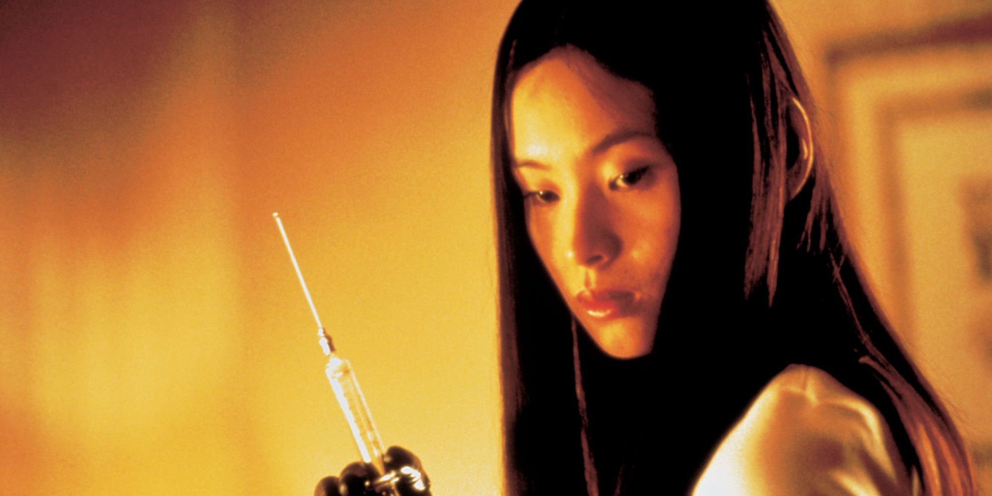 Asami from Audition holding a large syringe