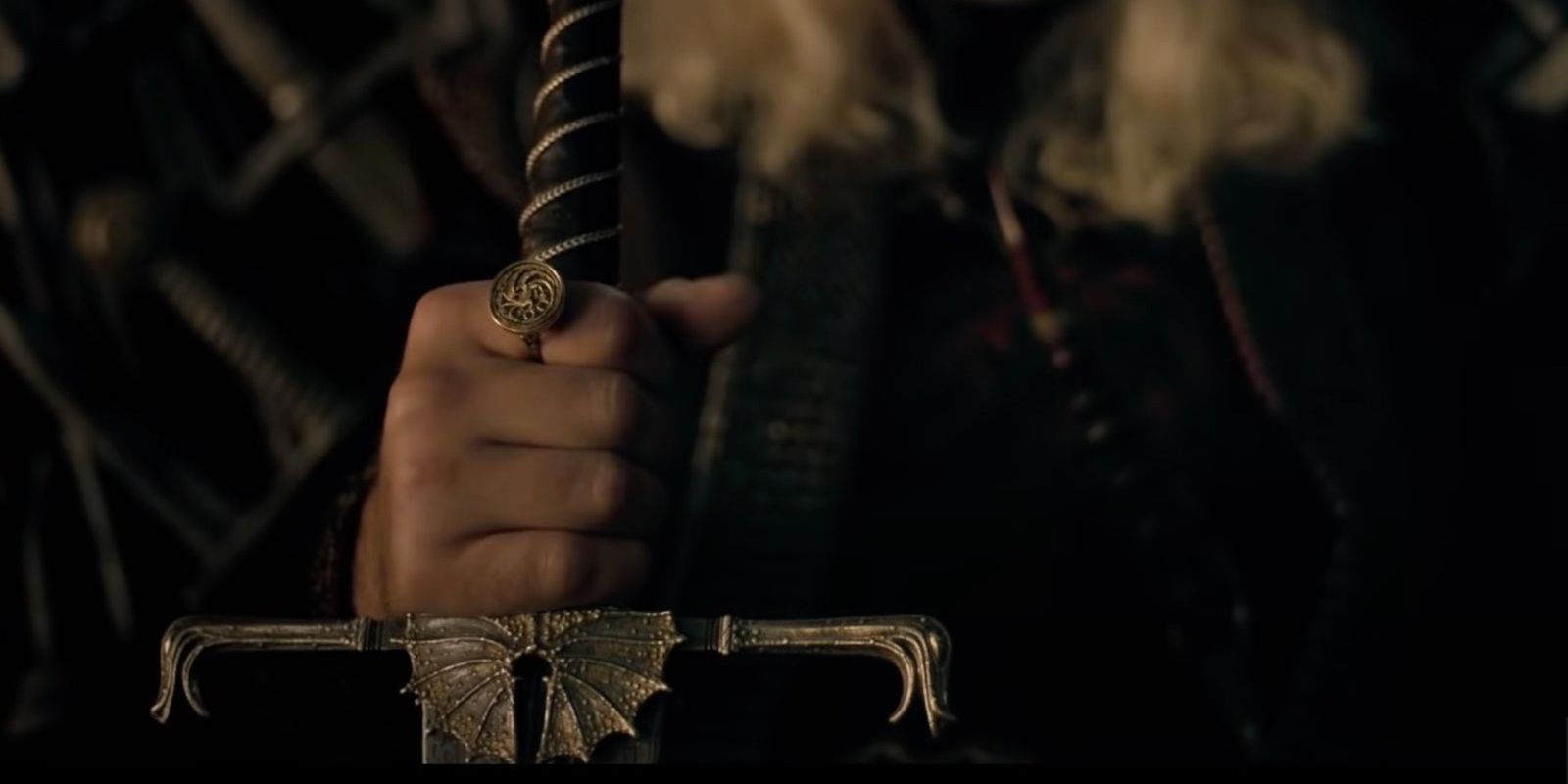 Blackfyre sword held by Viserys Targaryen sitting on the Iron Throne