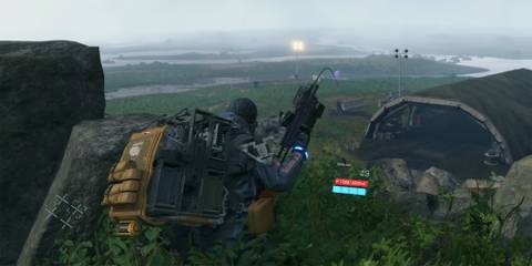 Death Stranding - Sam Using The Sticky Gun To Pull Cargo To Him From Very Far Away