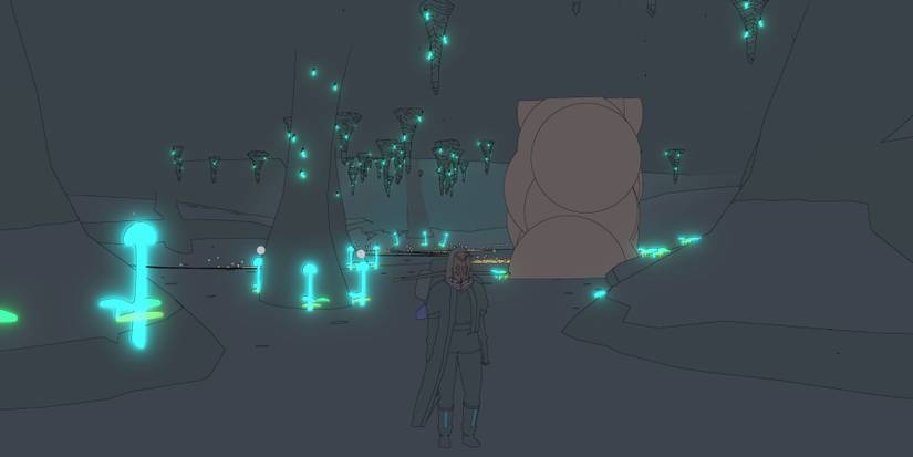 Sable standing in a dark cave with glowing mushrooms and worms 