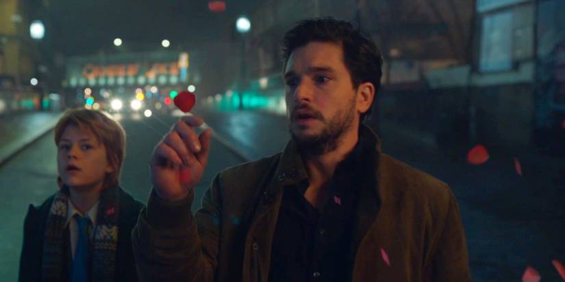 Danie Whitman touches a rose petal ahead of Sprite in Eternals