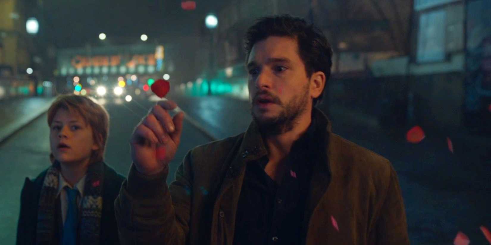 Danie Whitman touches a rose petal ahead of Sprite in Eternals