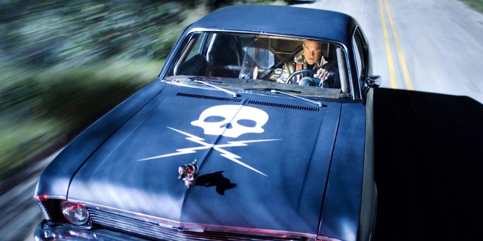 Kurt Russell driving a death-proof car in Death Proof