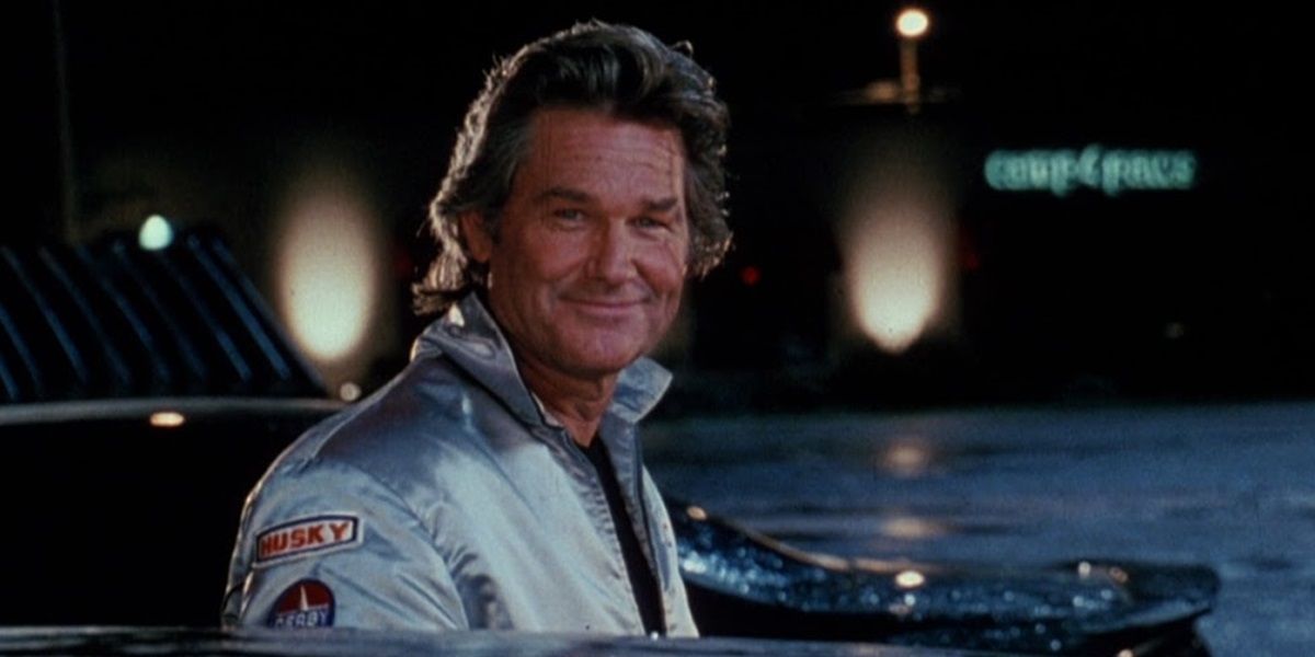 Kurt Russell smiling at the camera in Death Proof
